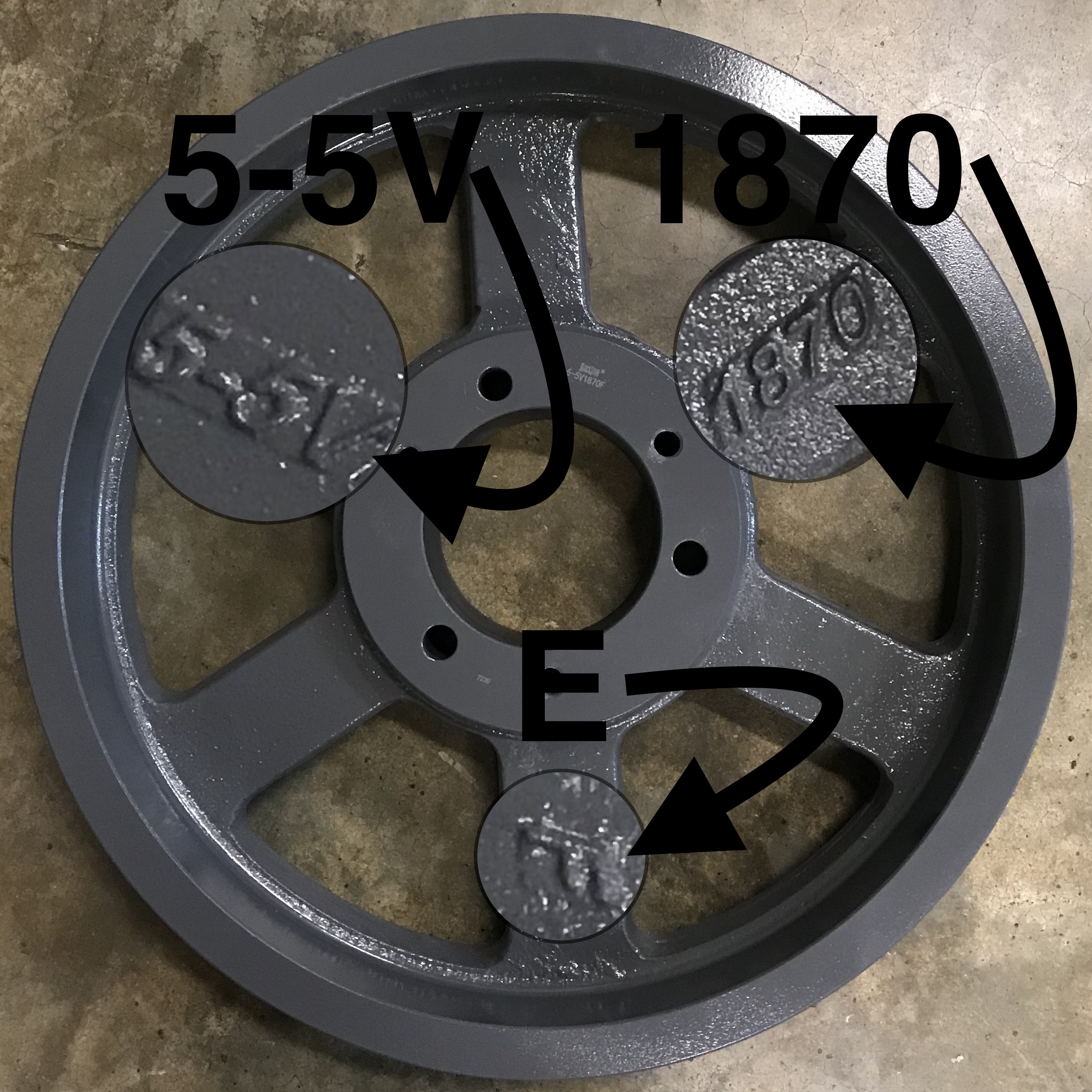 Pulley with different identification characters on different spokes